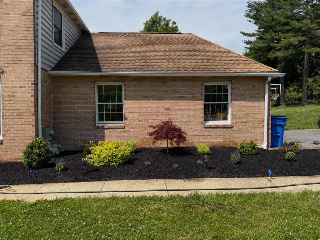 Redesigned foundation planting bed with mulch finish in Media, PA